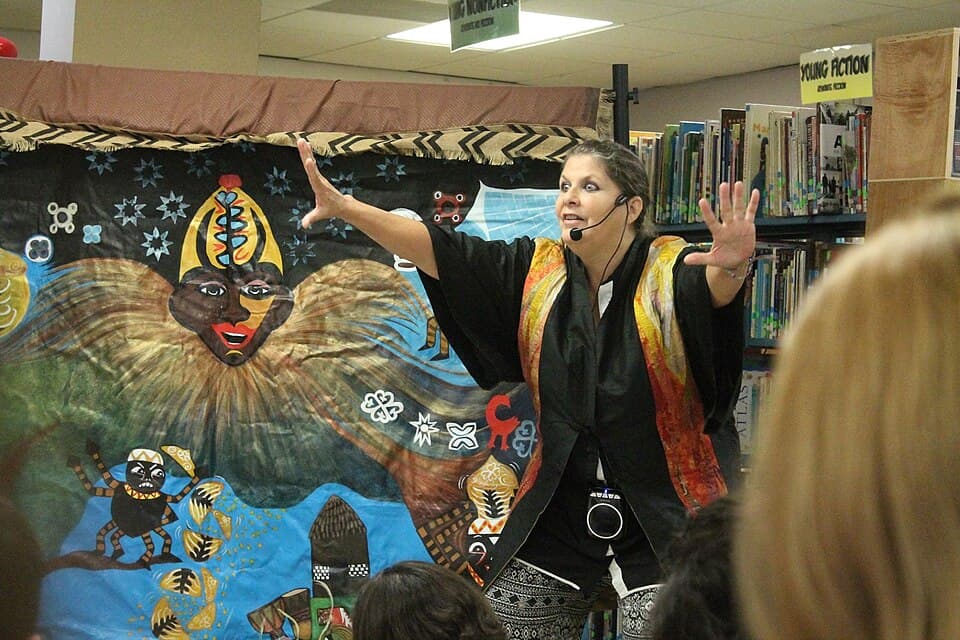 Tere Marichal, storyteller from Puerto Rico, telling the afro-caribbean folktale of Anansi at Biblioteca Juvenil de Mayagüez during a Multicultural Children's Book Day activity
