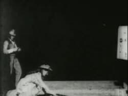 Annie Oakley shooting glass balls, 1894