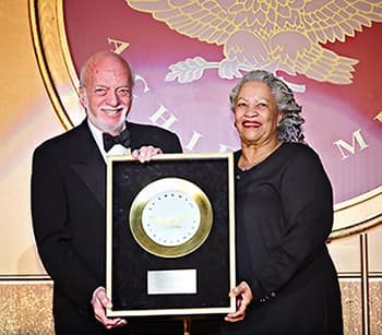 Broadway director Harold Prince receives the Golden Plate award from Nobel laureate Toni Morrison at the American Academy of Achievement’s 46th annual International Achievement Summit in Washington, D