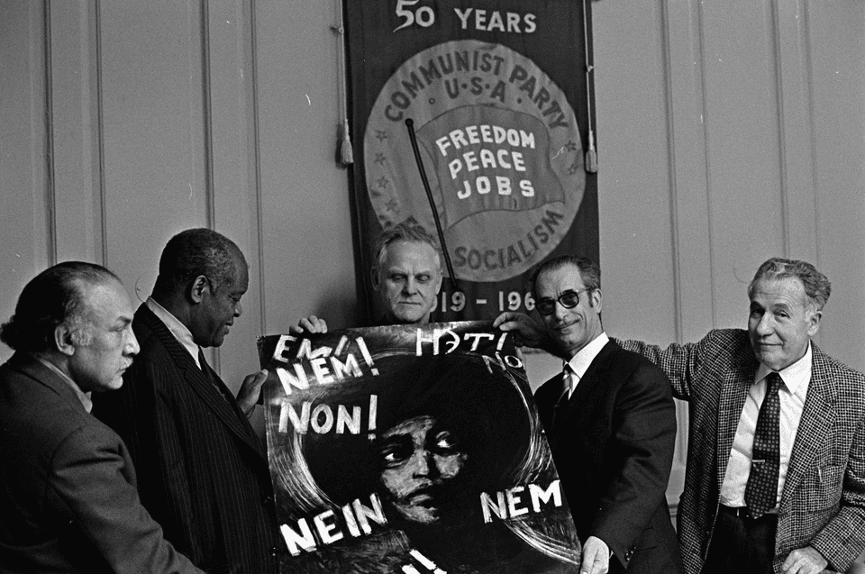 Painting of Angela Davis from Hungary Received by James E. Jackson, Henry Winston, Gus Hall, Peter Fulop (Hungarian Embassy) and Louis Weinstock. Photos by Garry Tyler. Jan 26, 1972 Slide 2 Edit