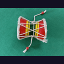 Ḍamaru (petit tambour à deux faces)
