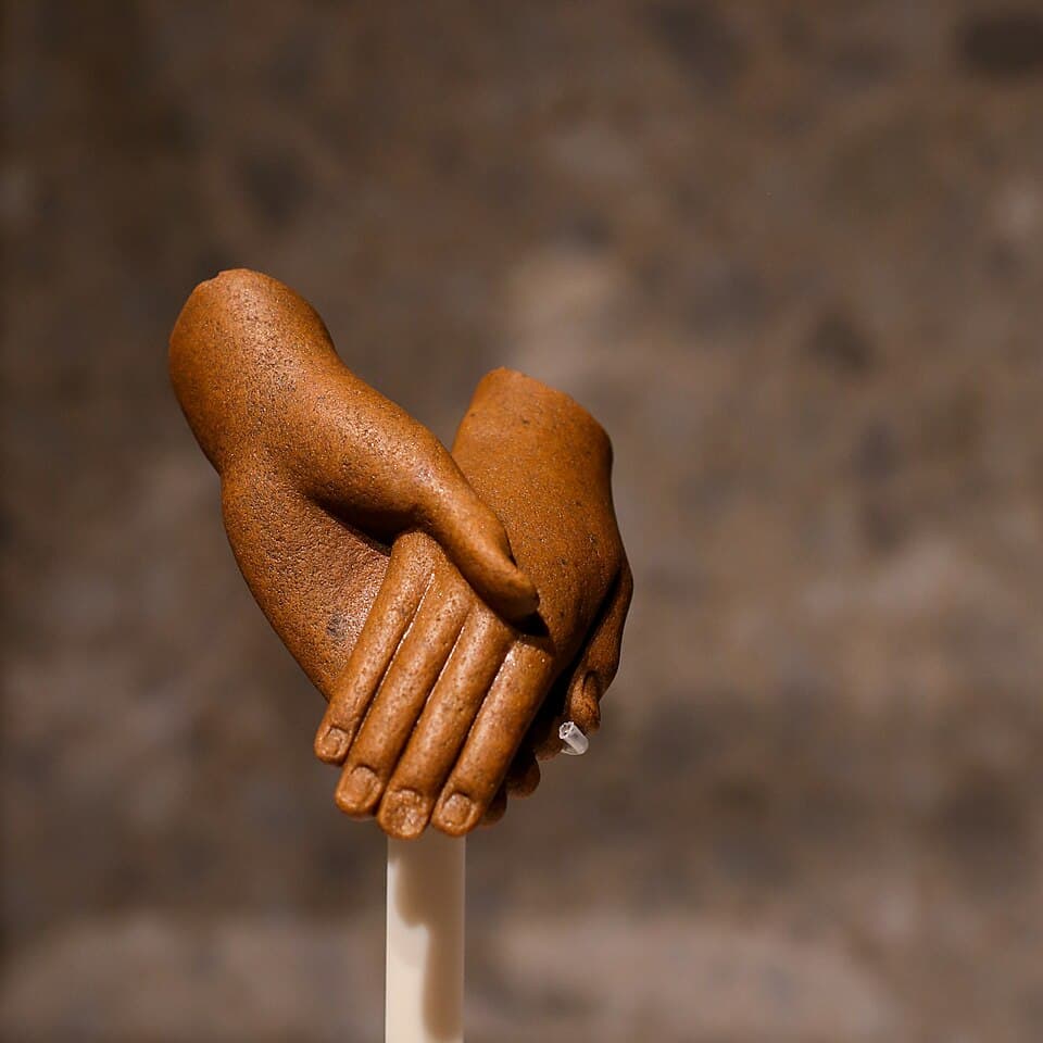 Pair of hands broken from a statuette group of Akhenaton and Nefertiti