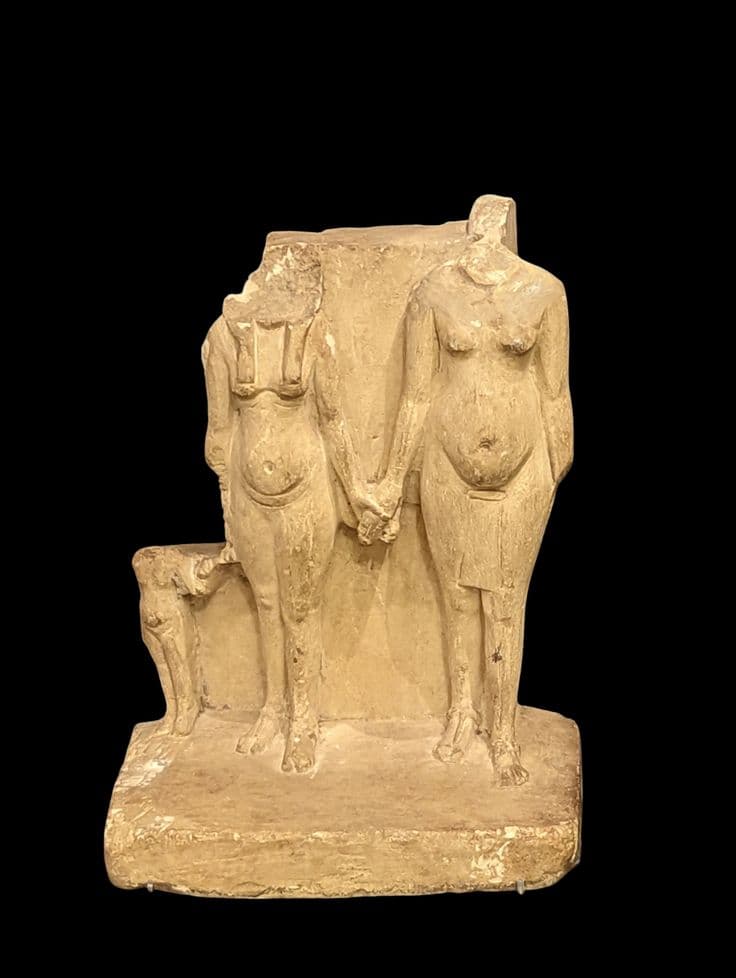 Limestone statuette of Akhenaten, his wife Nefertiti and one of their daughters